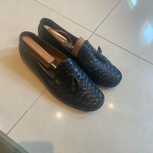 Men’s black coke Haan loafers in great condition .